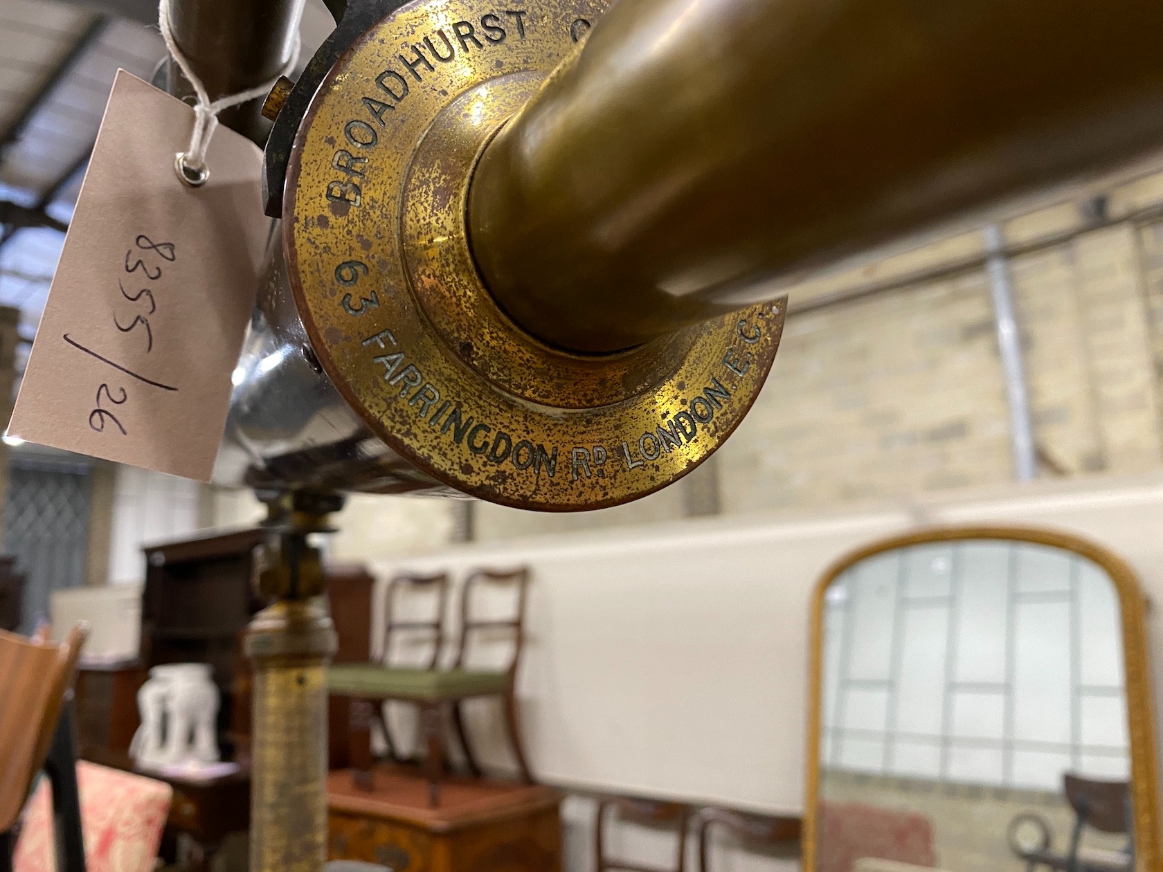 An early 20th century, Broadhurst and Clarkson astronomical telescope on folding tripod, the telescope length 110cm